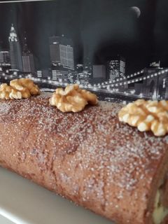 Una foto de Brazo gitano de chocolate y crema (bizcocho enrollado)