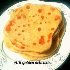 A picture of Flat bread served with potato soup.