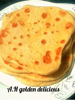 A picture of Flat bread served with potato soup.