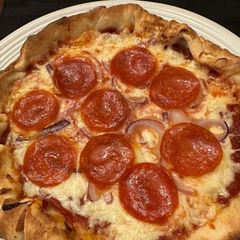 Cast Iron Skillet Pepperoni Onion Pizza A picture of Cast Iron Skillet Pepperoni Onion Pizza.