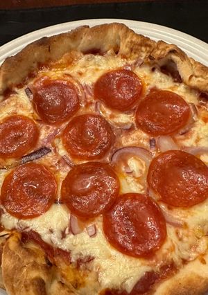 A picture of Cast Iron Skillet Pepperoni Onion Pizza.