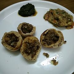 A picture of Litti choka with coriander chutney.