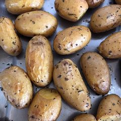 A picture of Mint and Garlic Roast Baby Potatoes.