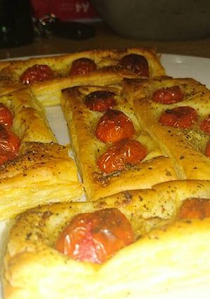 A picture of Puff pastry tomato poppers.