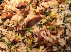 Una foto de Arroz con Espárragos silvestres, pancetta y Calçots