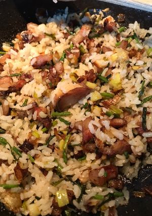 Una foto de Arroz con Espárragos silvestres, pancetta y Calçots
