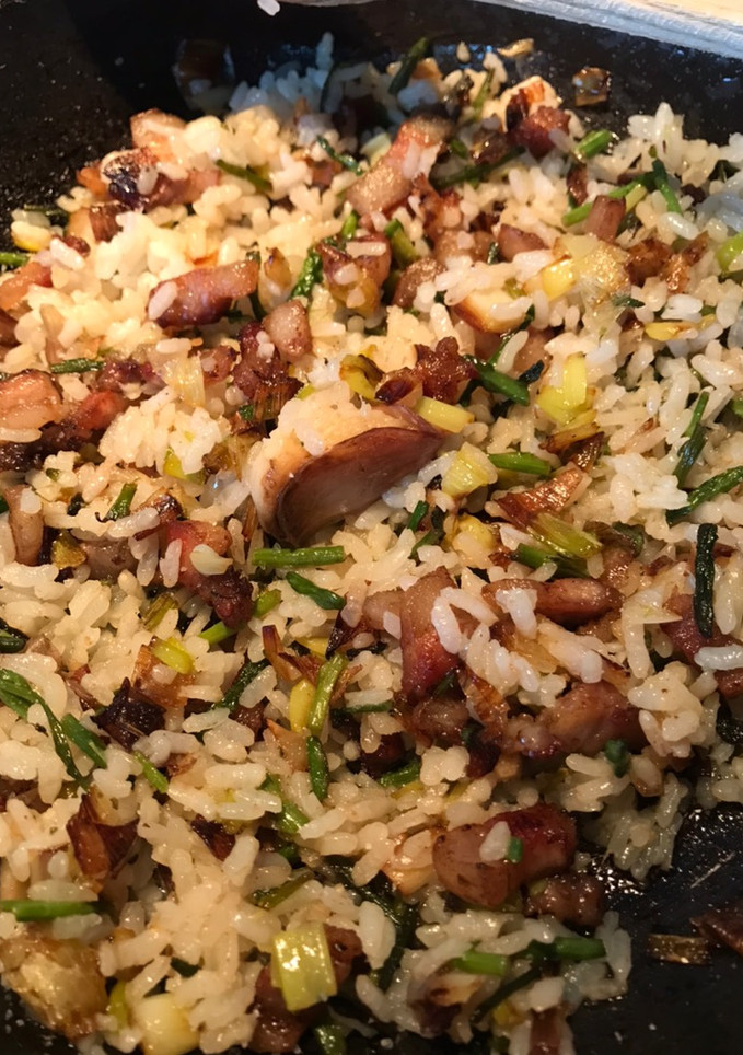 Una foto de Arroz con Espárragos silvestres, pancetta y Calçots
