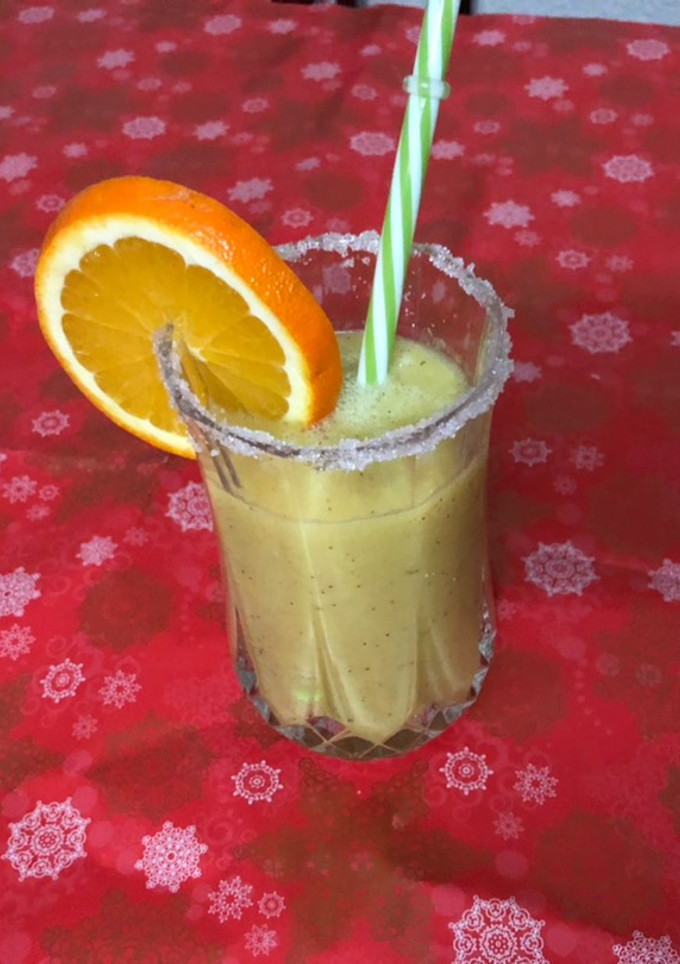 Una foto de Batido de naranja kiwi y leche de Almendra