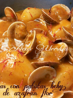 Una foto de Almejas con patatas baby, en salsa de azafrán