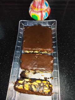 A picture of Biscuit Cold Cake with Chocolate Ganache.