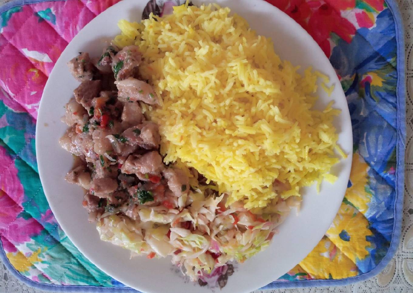 Tumeric rice with cabbage and pork