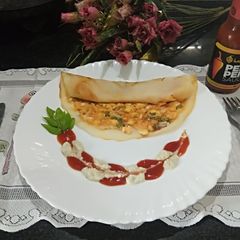 A picture of Paneer peri peri dosa.