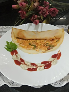 A picture of Paneer peri peri dosa.