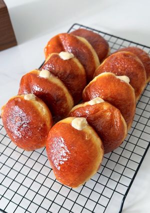 Hình của món Bomboloni (Donut nhân kem lạnh).