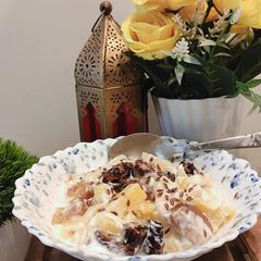 A picture of Healthy fruit salad with yoghurt and cream dressing.