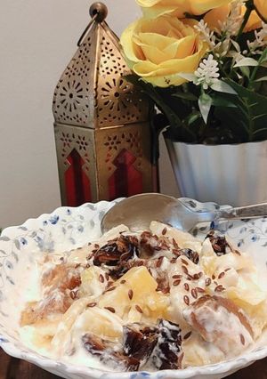 A picture of Healthy fruit salad with yoghurt and cream dressing.