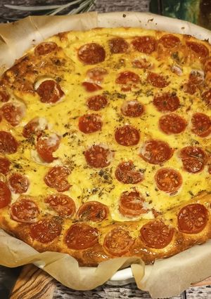 Una foto de 🥧 Quiche sin gluten con queso fresco y tomates cherry