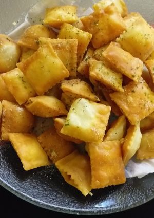 Una foto de Ravioles de ricotta fritos
