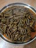 Stuffed Grape Leaves with Meat and Tomato Sauce