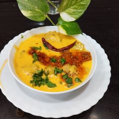 A picture of Methi Pakoda Kadhi.