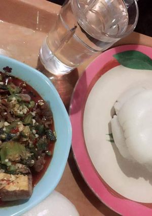 A picture of Okro soup with fresh cat fish.