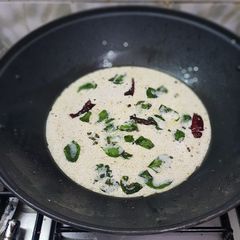A picture of Coconut Milk rasam.