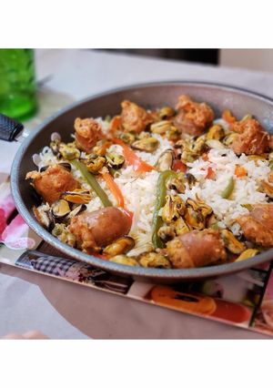 Una foto de Paella