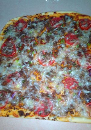 A picture of Beef n vegetables pizza.