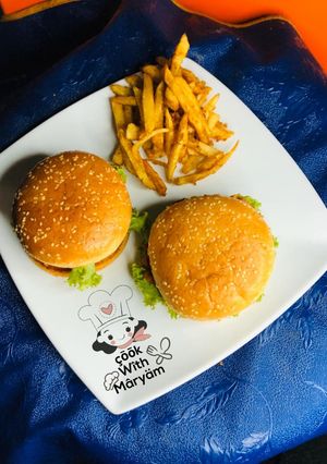 A picture of Zinger burger with fries.