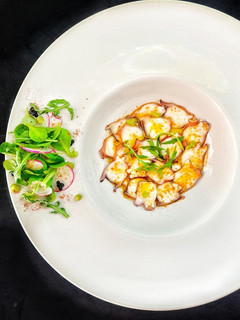 Una foto de Carpaccio de pulpo