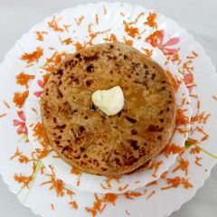 A picture of Carrot 🥕 and Garlic Paratha.