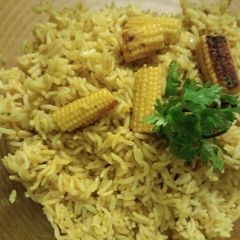 A picture of BabyCorn Biryani Cooked in Pressure Cooker.