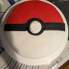 A picture of Pokemon themed Victoria sponge cake.
