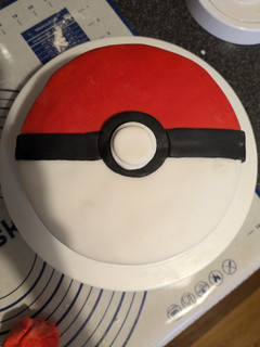 A picture of Pokemon themed Victoria sponge cake.