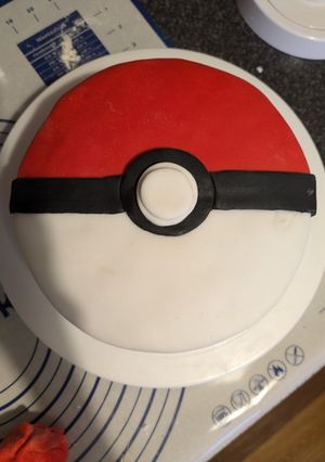 A picture of Pokemon themed Victoria sponge cake.