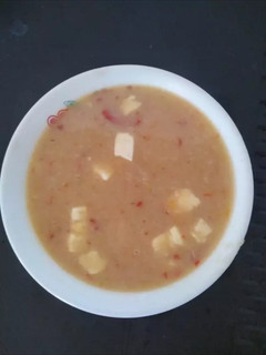Una foto de Mote de ñame y queso