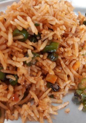 A picture of Yummy Schezwan Rice.