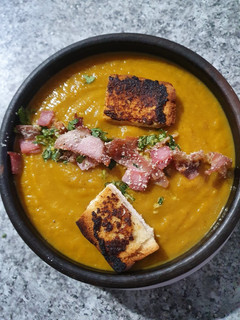 Una foto de Crema de zapallo y zanahoria..