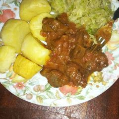 A picture of Roasted potatoes and wet liver.