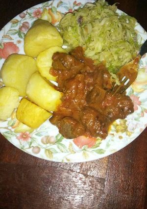 A picture of Roasted potatoes and wet liver.