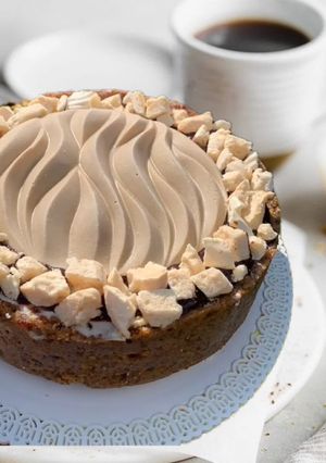 A picture of Vegan Coffee, Chocolate, and Vanilla Panna Cotta Cake.