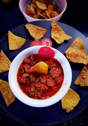 A picture of Indian style simple Salsa nachos.