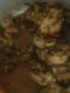 A picture of Chicken stew and spinach.