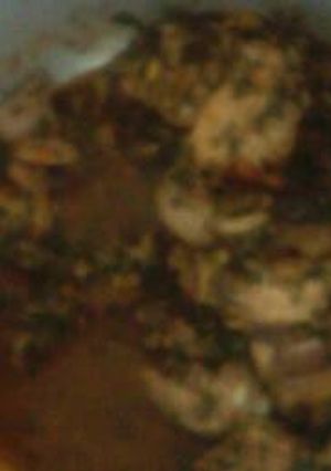 A picture of Chicken stew and spinach.