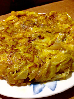 Una foto de Tortilla de patatas con cebolla
