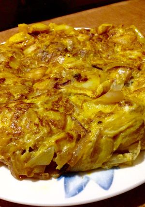Una foto de Tortilla de patatas con cebolla