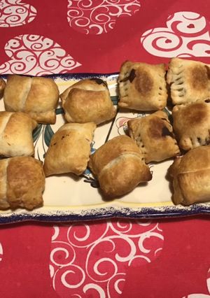 A picture of Savory Puff Pastry Bites with Prosciutto and Prunes.