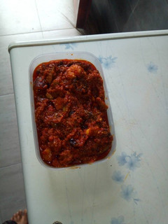 A picture of Fresh tomatoes stew with goat meat.