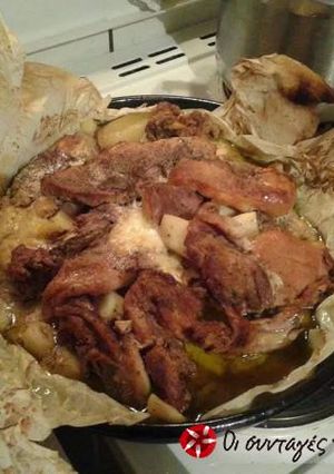 Φωτογραφία της συνταγής Χοιρινό στη λαδόκολλα με πατάτες και πορτοκάλι