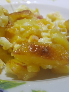Una foto de Patatas Lucio con bacon y queso